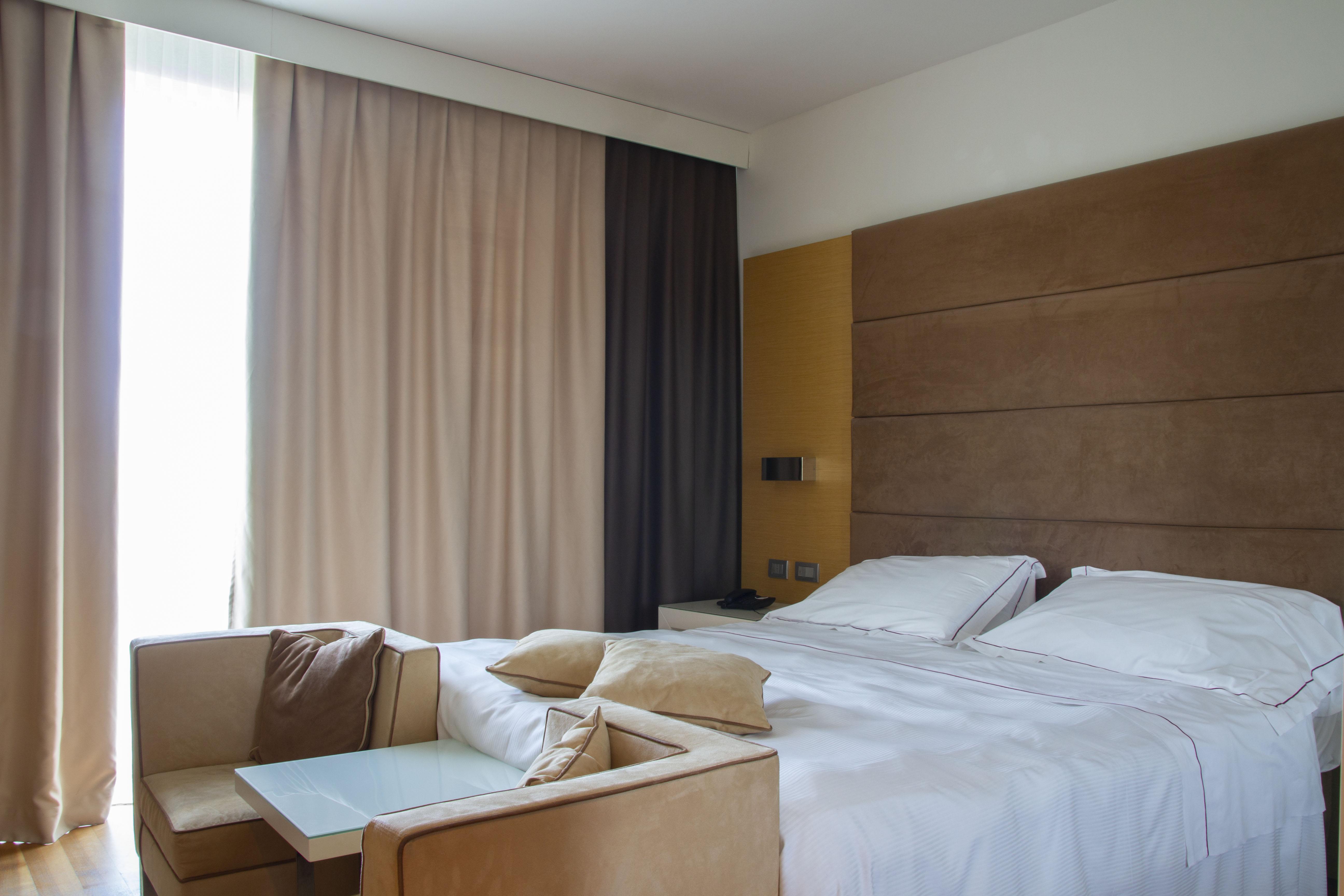 Pisa Tower Plaza酒店 外观 照片 A bedroom