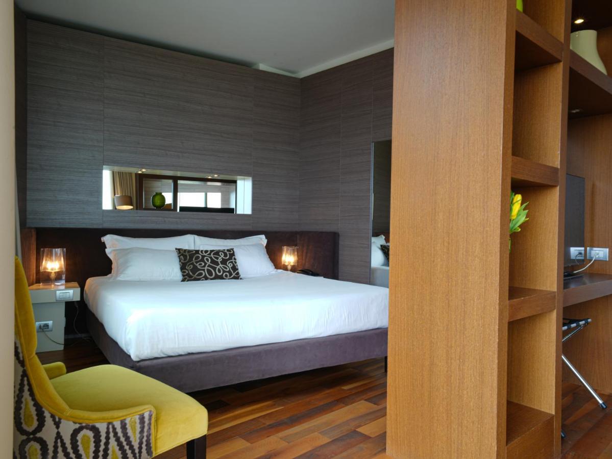 Pisa Tower Plaza酒店 外观 照片 A bedroom at the hotel